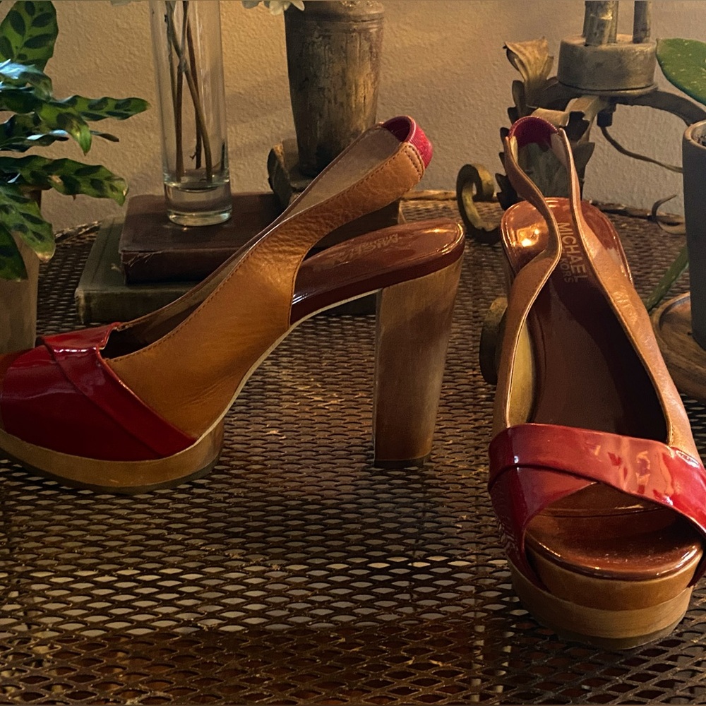 Barely worn Michael Kors peep toe, slingback platforms size 7.5